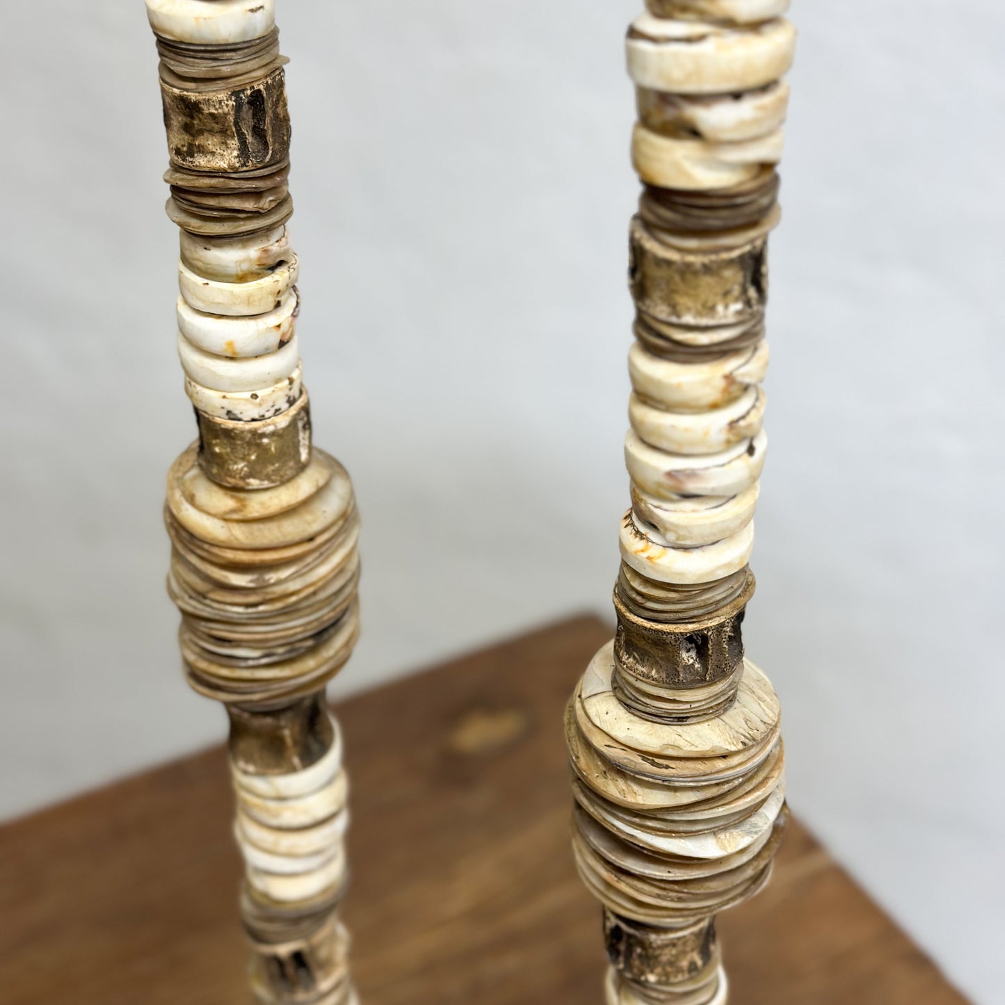 Olon Shell Coins on Stand